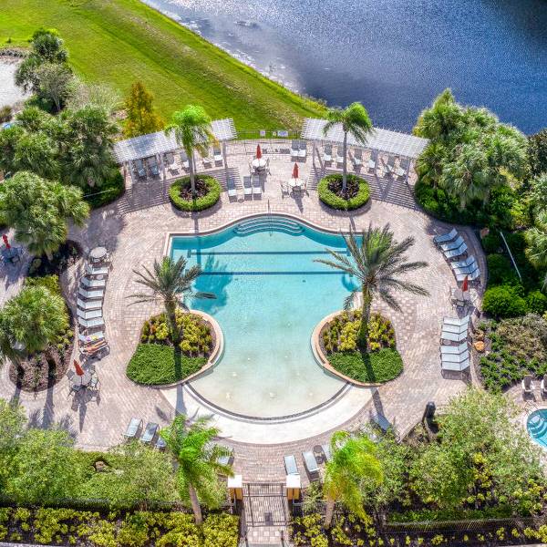 Watersong Resort amenities including pool and lake views in Davenport Florida short-term rental community