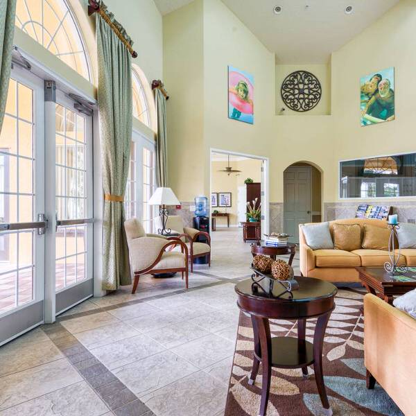 Resort-style clubhouse interior at Watersong Davenport Florida featuring welcoming seating and upscale design