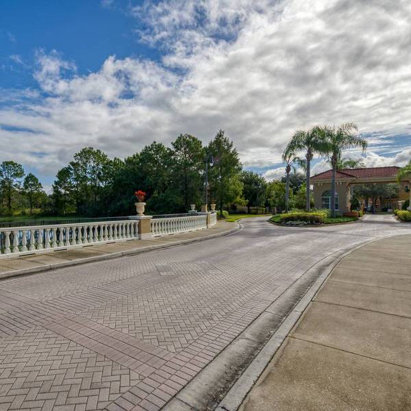 Shaded picnic area at Watersong Resort in Davenport Florida with outdoor seating and lake views
