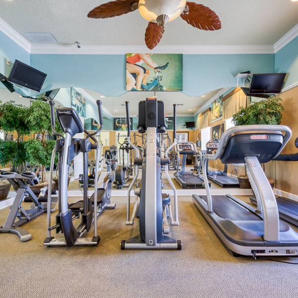 Watersong Resort fitness center in Davenport Florida with treadmills elliptical machines and full gym equipment
