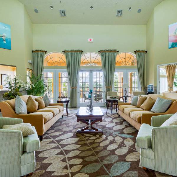 Resort-style clubhouse lounge at Watersong Davenport Florida offering comfortable gathering space for vacation guests