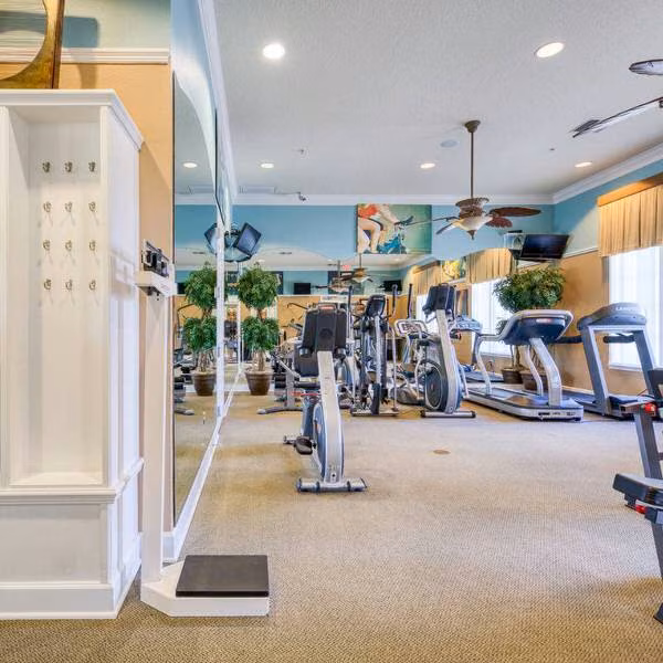 Watersong Resort fitness center with cardio machines, treadmills, and workout equipment in Davenport Florida