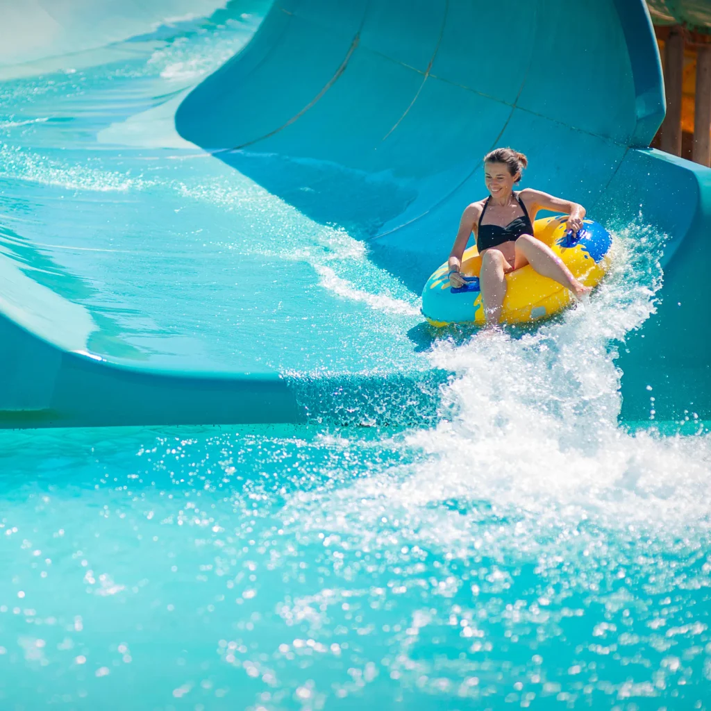 Traveler going down a waterslide fun at orlando's top water parks in florida